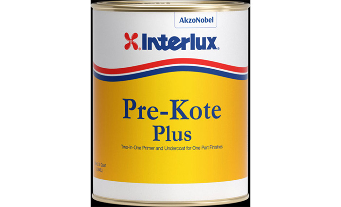 White, red, yellow and blue can of Interlux Toplac Plus paint.