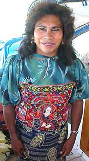Photo of Lisa Harris wearing a medicine woman design mola