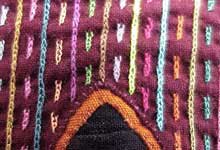 Photo of close-up of mola-stitches
