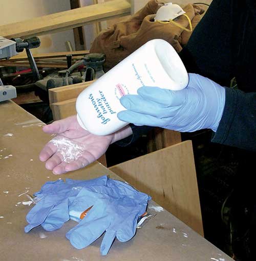 Talc helps latex gloves slip on easily