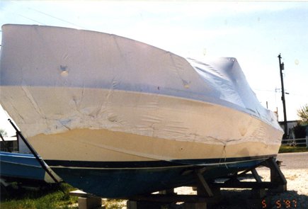 Shrink-wrapped Boat Out of the Water