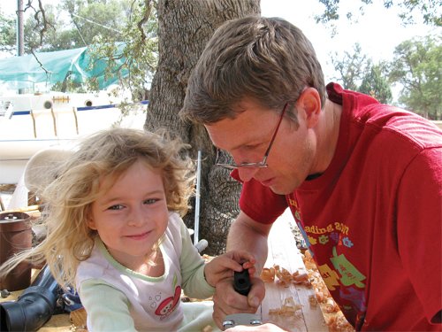 Antigone helps dad build a boat!