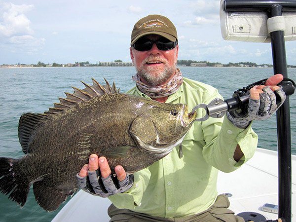 Captain Rick Grassett with Tripletail