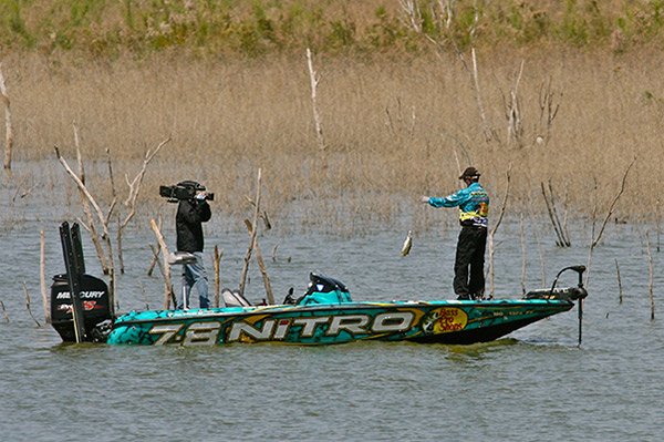 Rick Clunn Yanking a Bass from Falcon Lake