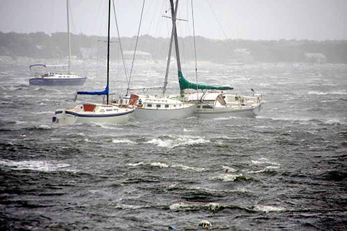 Boats moored in storm
