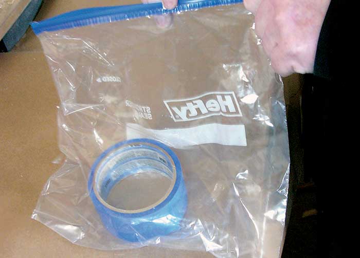 String masking tape in a ziplock bag
