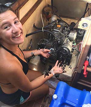 Emily changing the oil filter