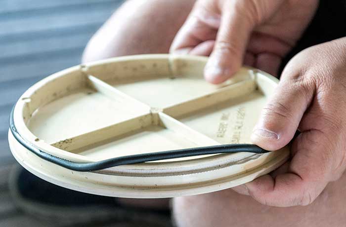 Rolling new seal in place