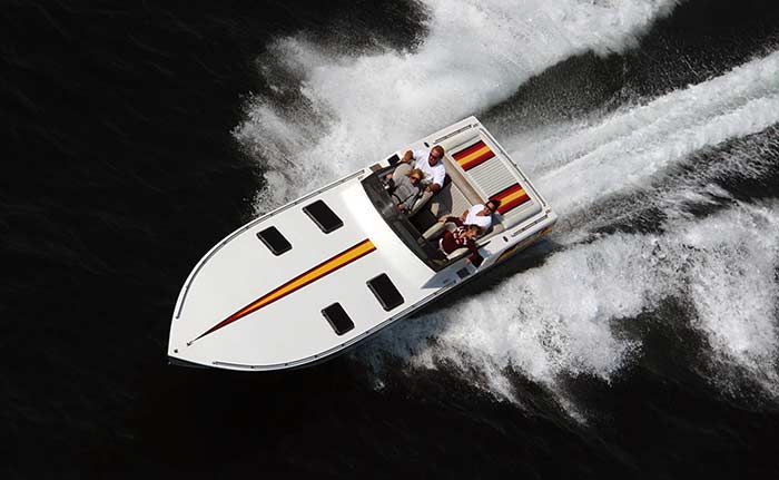 An aerial shot of a powerboat underway