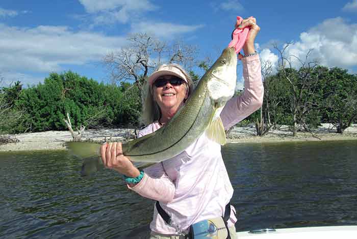 Betty Bauman with 32-inch snook