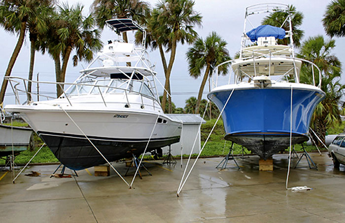 Photo of boats hauled out and strapped down before a hurricane