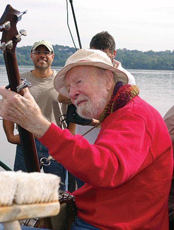 Pete Seeger playing banjo
