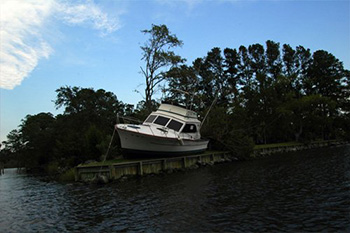 Partially sunk boat at Whitaker Creek