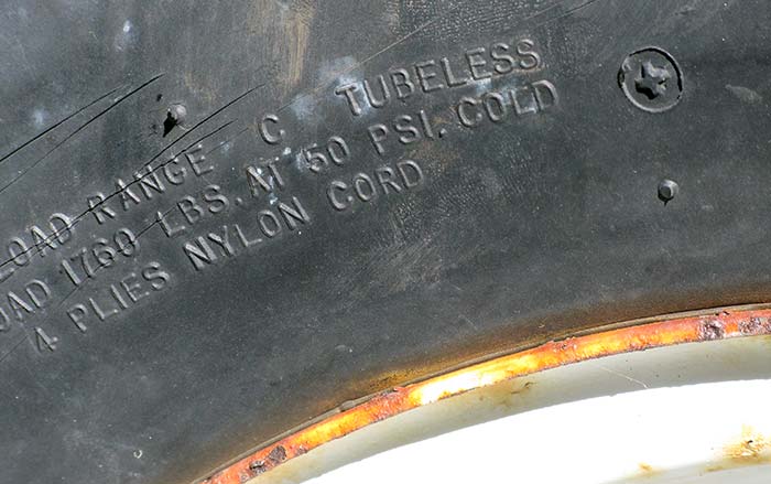 Load range markings on the sidewall of a trailer tire