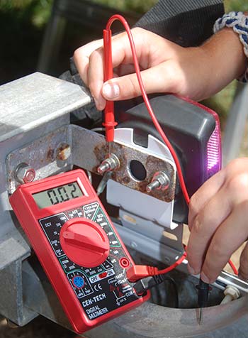 Using a voltmeter to test boat trailer wiring
