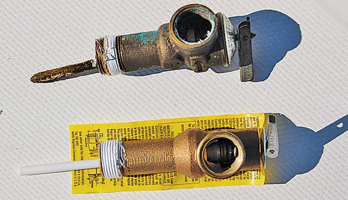 Old and new pop-off valve from a water heater