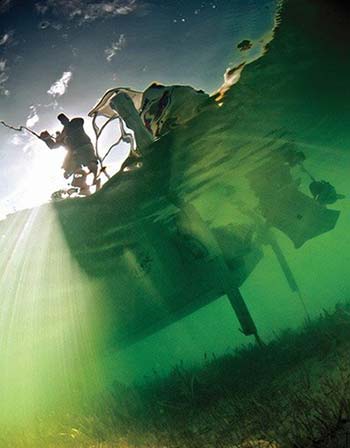 Minn Kota auto anchor seen from underwater