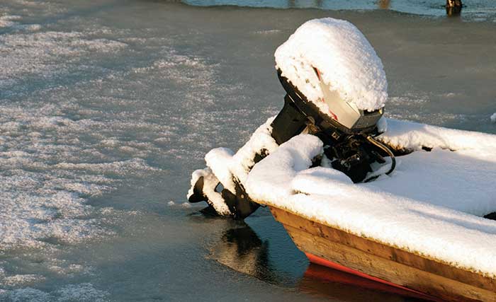 Outboard covered in snow