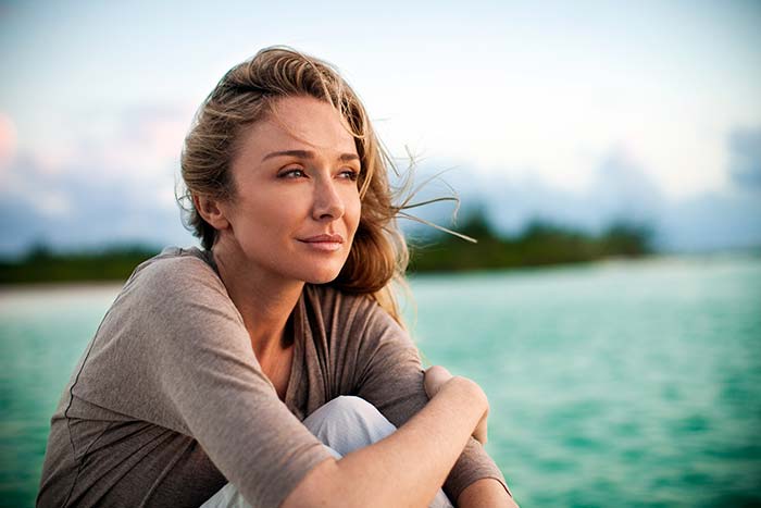 Portrait of Alexandra Cousteau with turquoise-colored water in the background