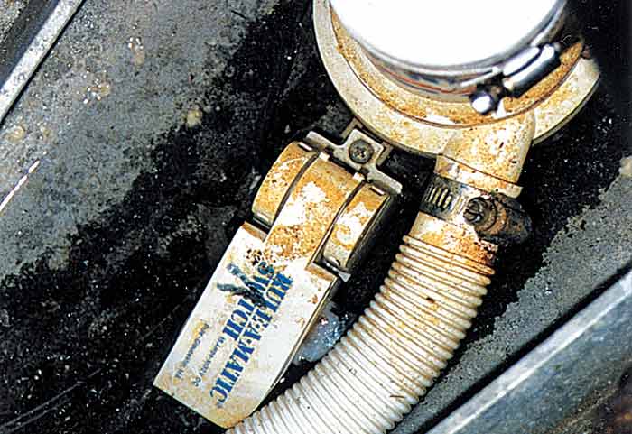 Trapped bilge pump switch