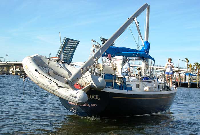 Sailboat damaged from hitting a bridge