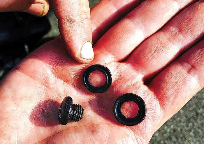 Comparing old and new drain screw gaskets