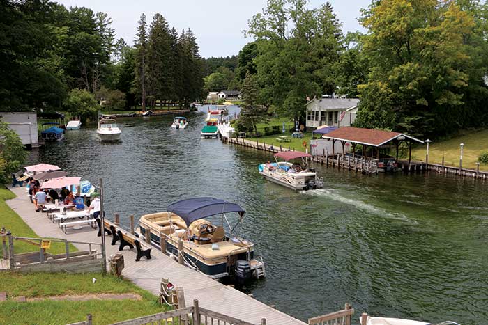 Boaters transiting between Burt and Mullett lakes pass