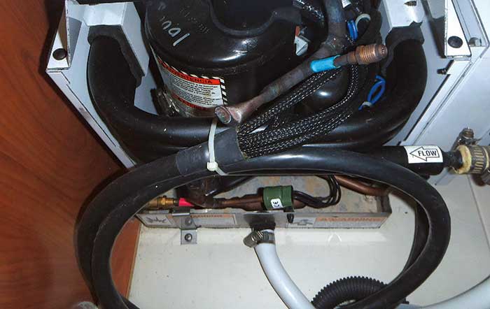 Air conditioner condensation tray and drain