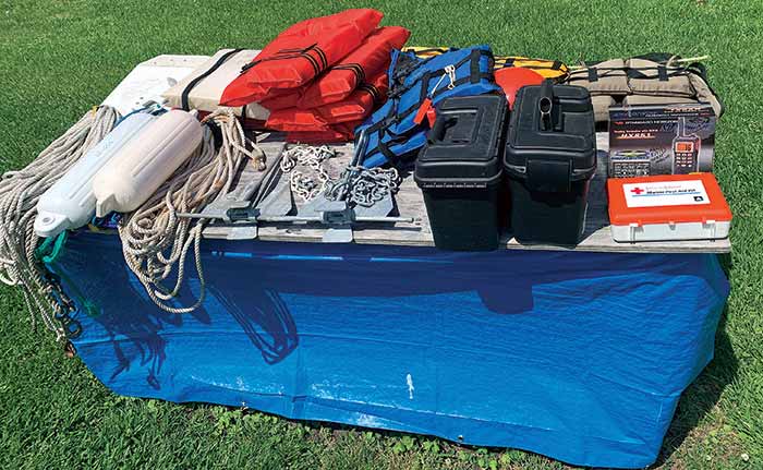 Basic boating equipment including, ropes, fenders, anchors and first aid kit