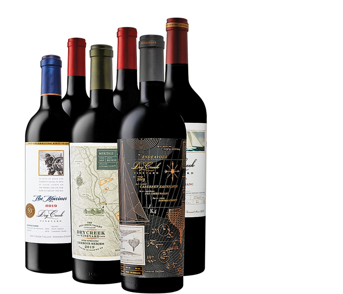 A half dozen bottles of wine featuring artwork of traditional vessels.