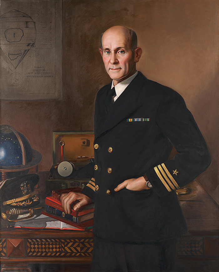 Painting portrait of Captain Philip Van Horn Weems standing next to his desk in his naval uniform.