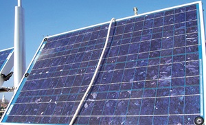 Large solar panel in use on a clear and sunny day.