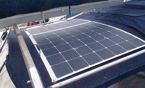 Solar panel mounted on a vessel in use during a sunny afternoon.