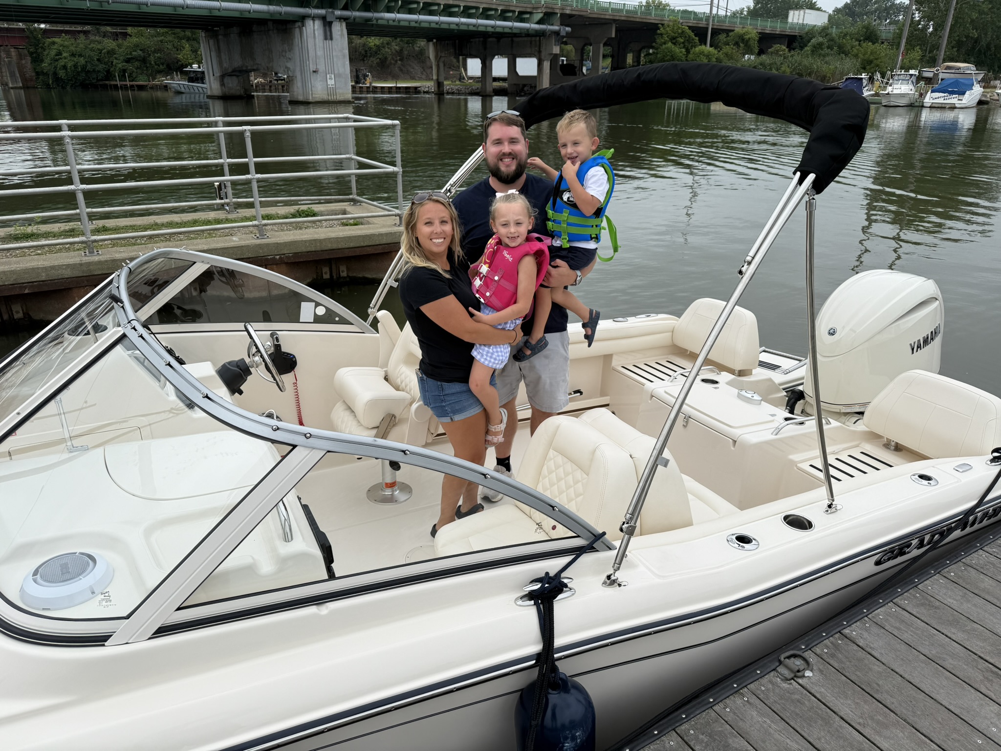  Nicholas Braun and his family aboard their new Grady-White Freedom 215 boat 