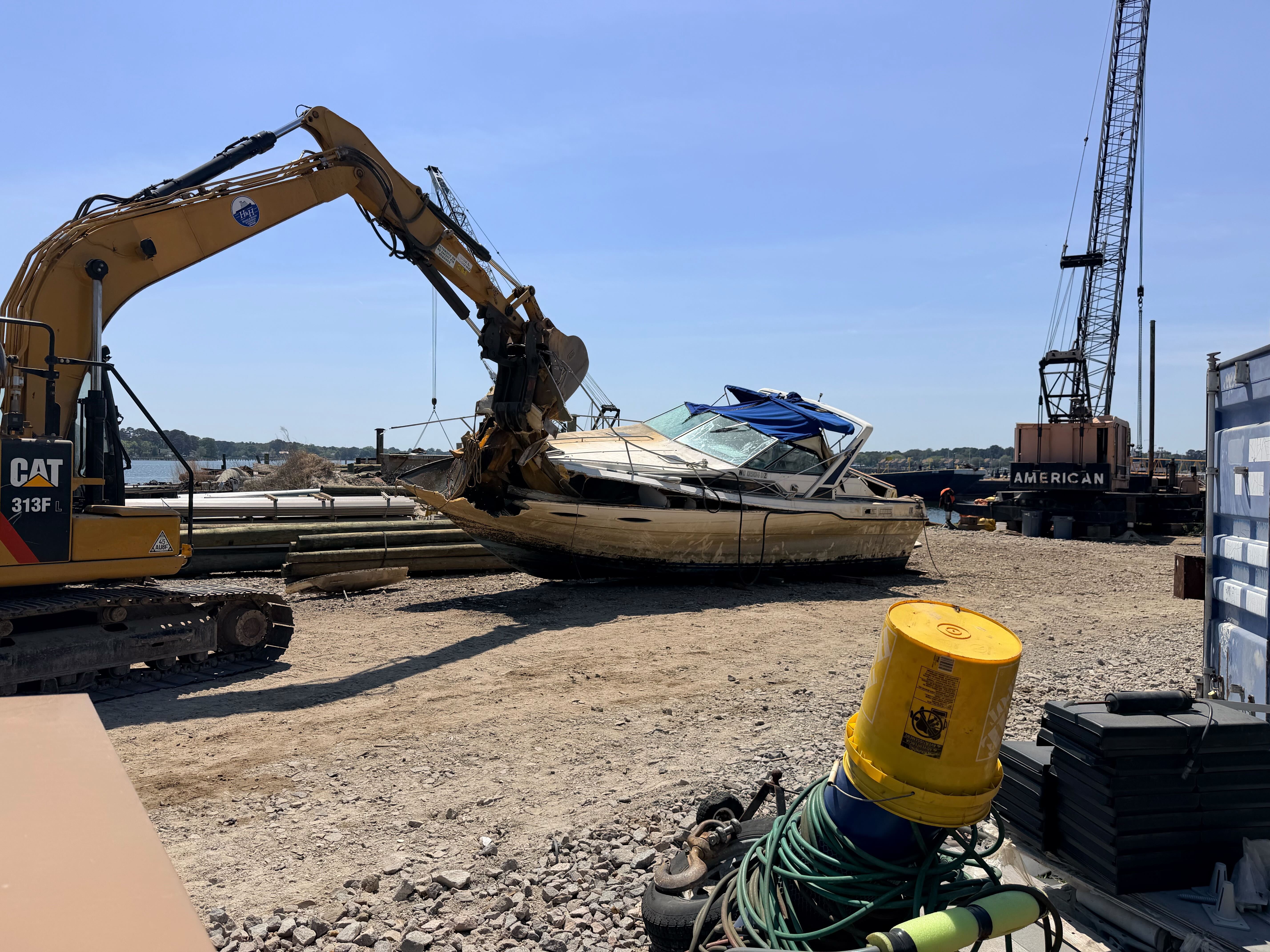  An image of an ADV removed from the Elizabeth River and being crushed for disposal.   