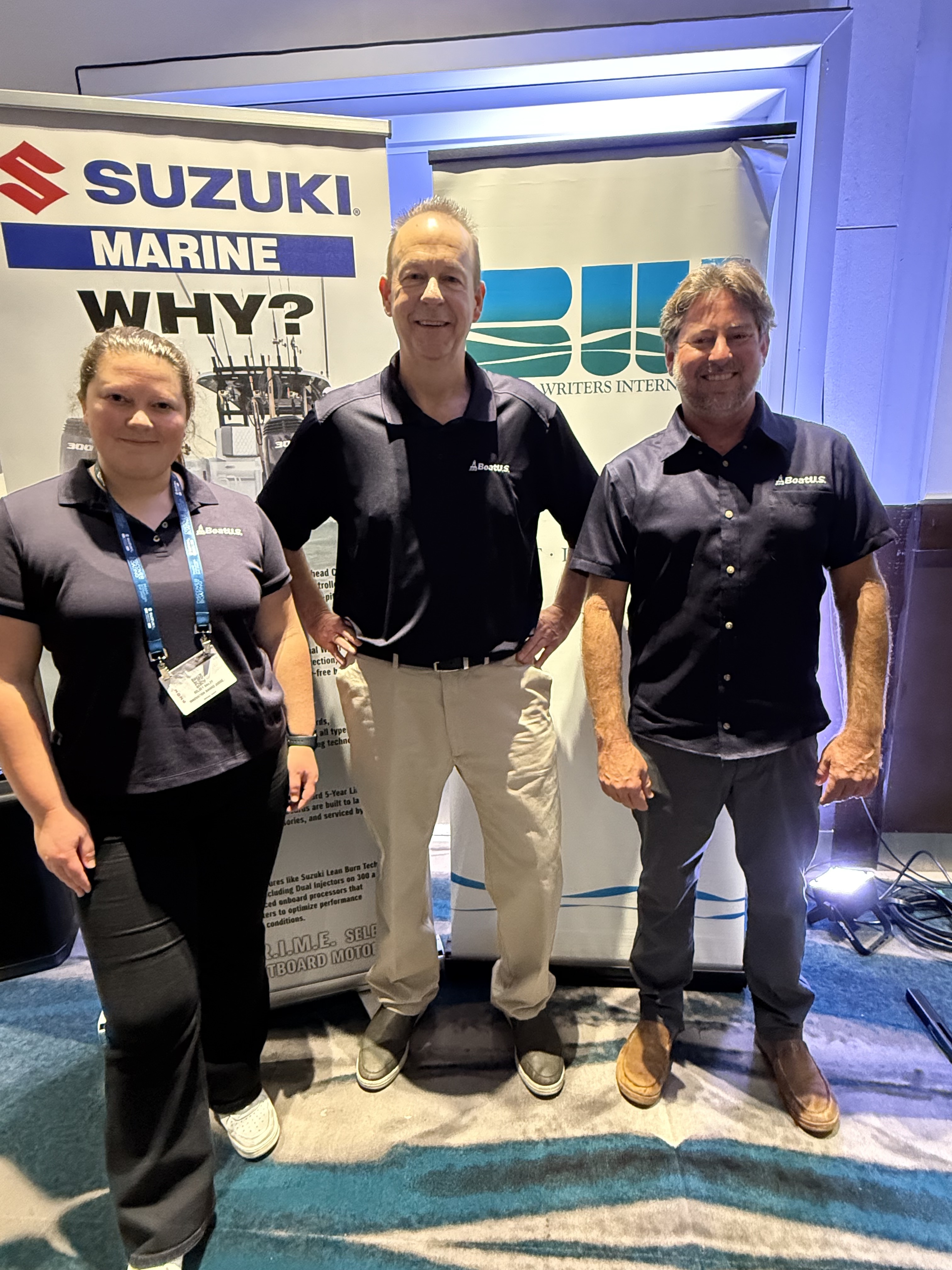 BoatUS Magazine staff Kelsey Bonham Bailey, Rich Armstrong, and Mike Longman at BWI Awards Presentation  
